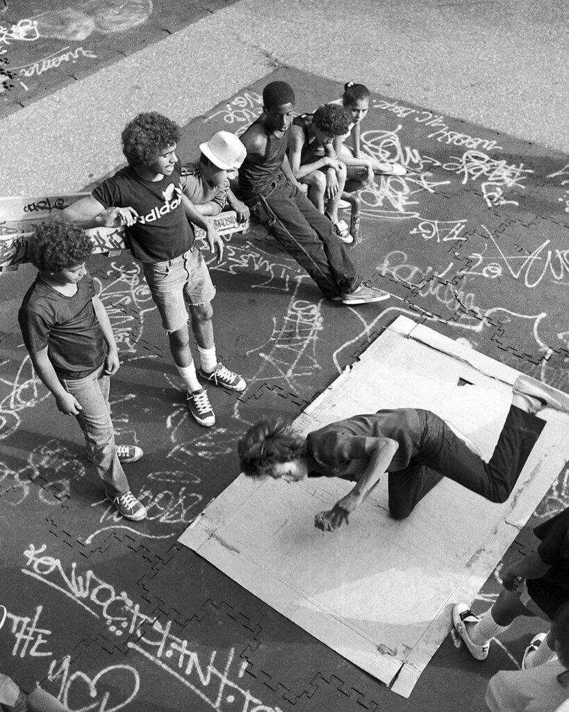 Martha Cooper: The Icon Of Street Art Photography - Doze in 1981 spinning on cardboard in what is now known as Rock Steady Park Photo Courtesy of ©Martha Cooper